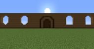 Walls, oval-shaped windows, and a massive door built up for a mansion (Image via u/OcarinaOfTime42/Reddit)